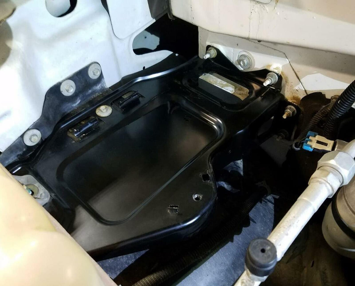 ARONOVA tray installed under hood demonstrates correct fit and secure battery support