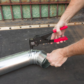 Arrow Fastener RHT300 in use on automotive panel for tight-space riveting