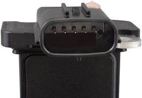 Astemo Hitachi MAF0035 beside ruler showing compact OE-compatible size