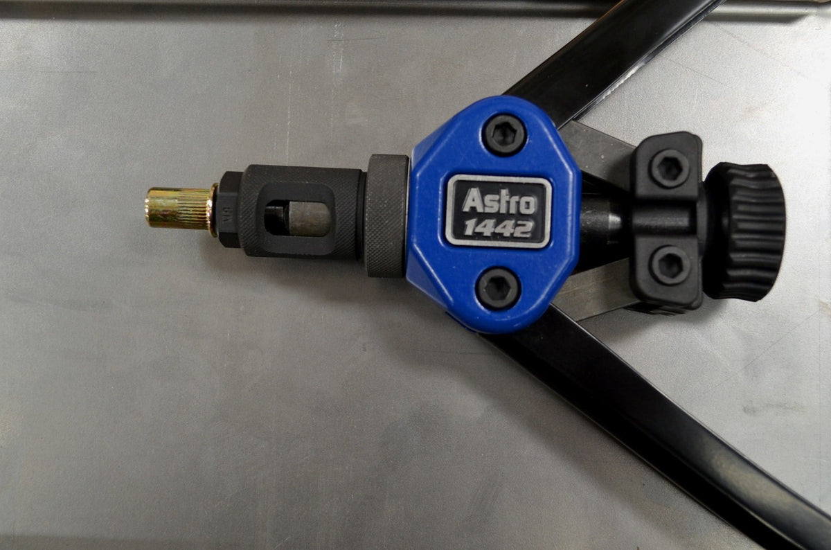 Astro Pneumatic riveter in use in a tight vehicle area demonstrating improved access benefit