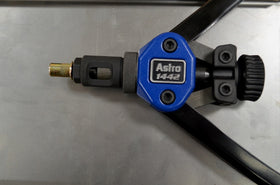 Astro Pneumatic riveter in use in a tight vehicle area demonstrating improved access benefit