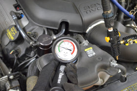 Astro Pneumatic color-coded cap adapters spread out to show broad vehicle compatibility benefit