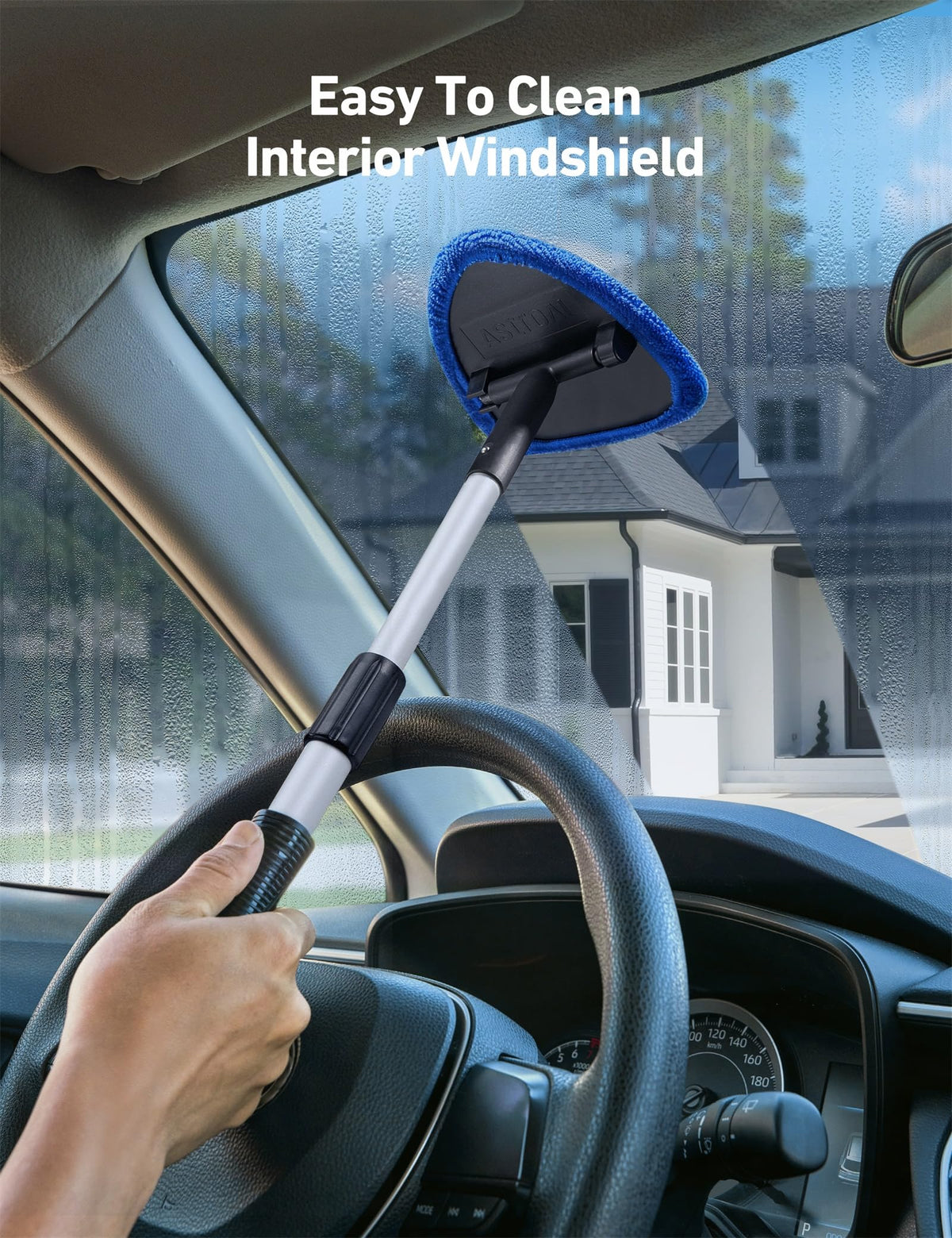 AstroAI tool cleaning a car interior windshield for streak-free visibility