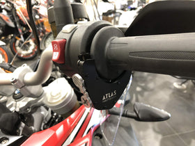 ATLAS Throttle Lock on motorcycle in motion showing reduced wrist fatigue on rides