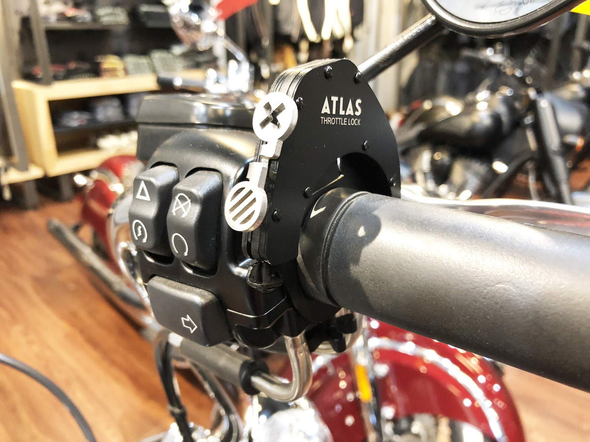 ATLAS Throttle Lock on motorcycle cruising highway showing comfort for long rides