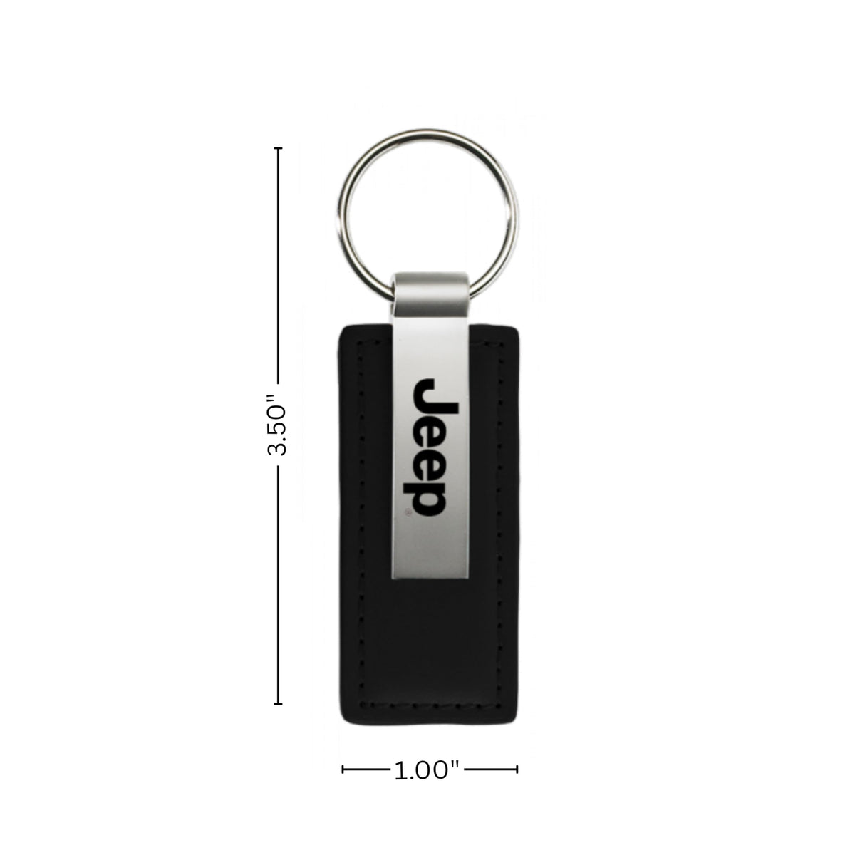 AU-TOMOTIVE GOLD key fob on a Jeep dashboard conveying branded lifestyle appeal