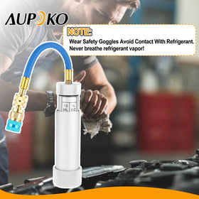 Aupoko injector next to ruler for scale, compact 2 oz size for easy storage