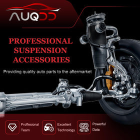 AUQDD ball joints on a workbench during garage install showing straightforward replacement