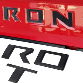 Auto safety installed letters on Frontier in outdoor setting showing visual upgrade