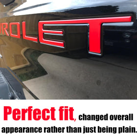 AUTO SAFETY letters installed on truck tailgate showcasing bold red contrast