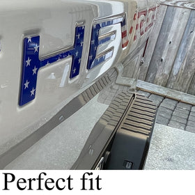 Auto safety installed on truck tailgate in driveway showing easy upgrade and striking look