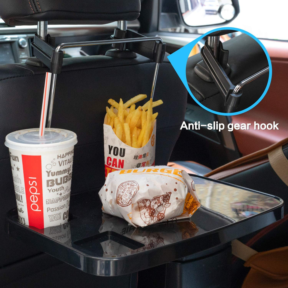 AutoChoice tray hung on steering wheel delivering a compact workspace while parked