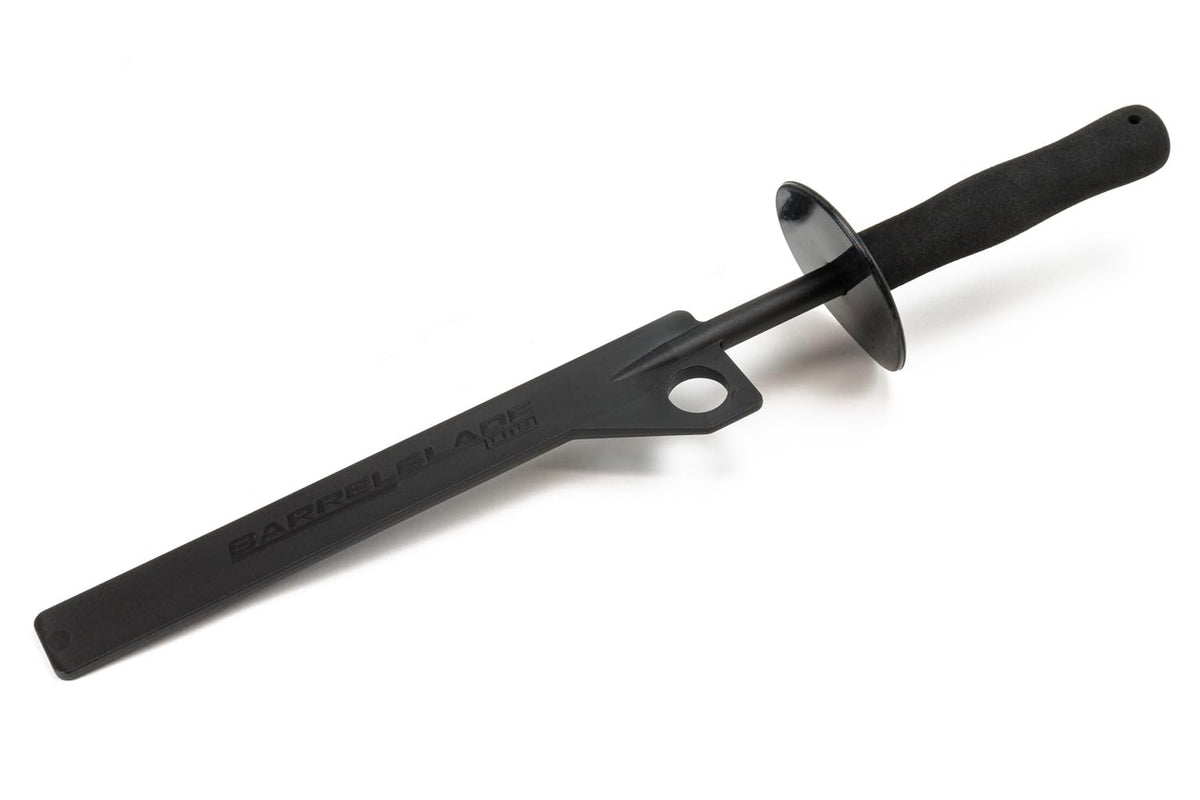 Autofiber brush on garage bench with wheel tools showing professional detailing efficiency