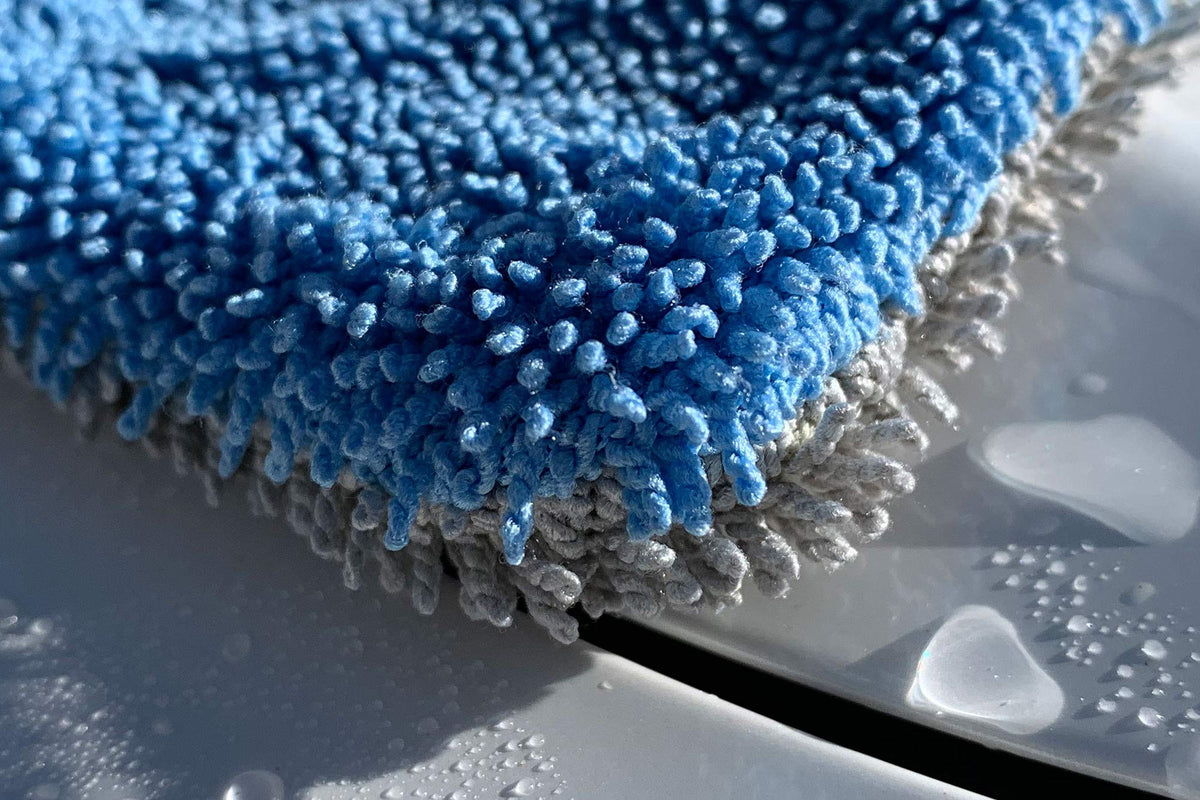 Autofiber Dreadnought XL drying an SUV hood fast with gentle, scratch-free glide