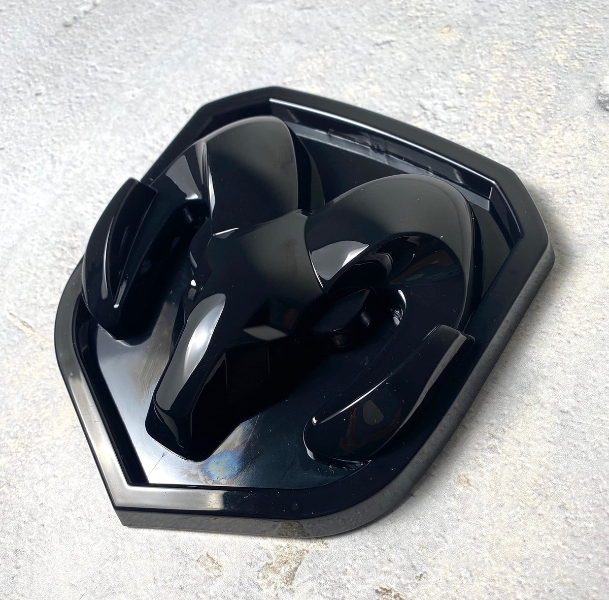 Autogem front grille emblem installed on RAM truck improving front-end style