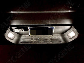 AUTOGINE license plate light installed showing brighter rear visibility and clarity