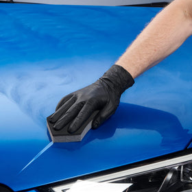 Autoglym being applied on car panel demonstrating quick removal and gloss