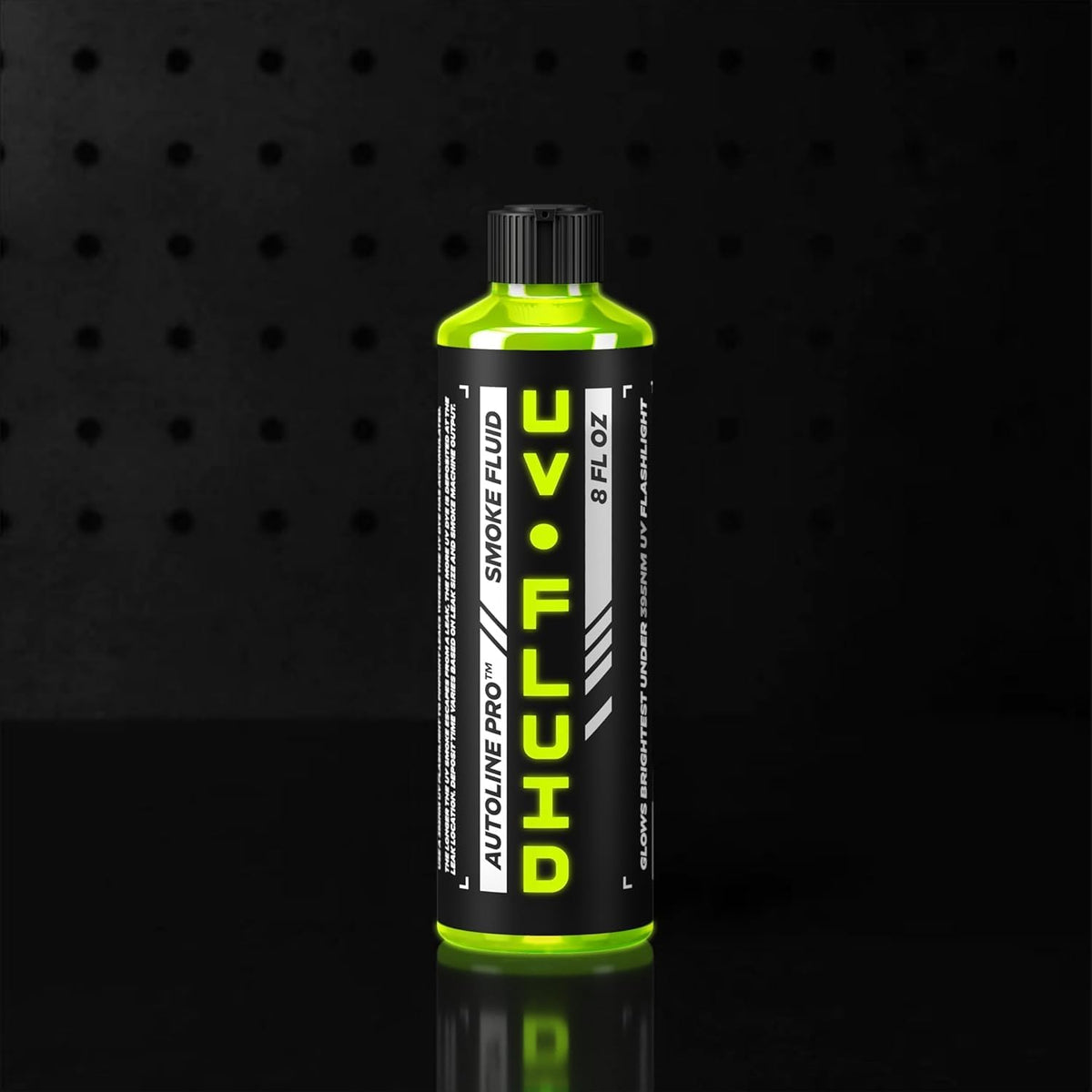 AutoLine Pro bottles next to tape measure showing compact 16oz total size