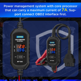 AUTOOL cable beside a ruler for scale demonstrating compact size and portability