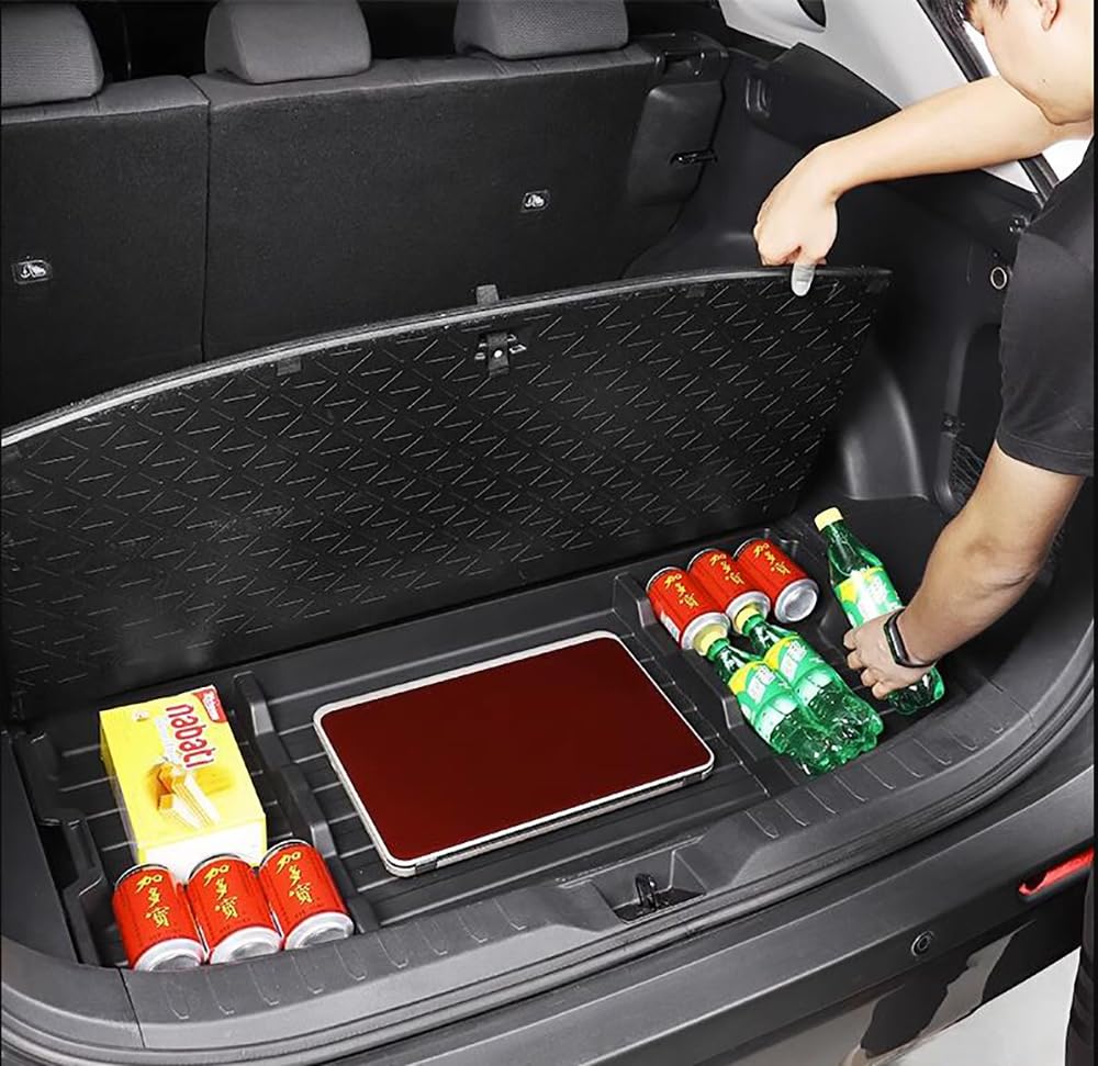 AutoQi side profile demonstrating precise fit under RAV4 cargo floor for stability