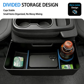 Autorder holding a travel mug and small gear showing practical storage