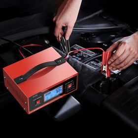 AUTOUTLET product label and specs closeup highlighting voltage and safety features