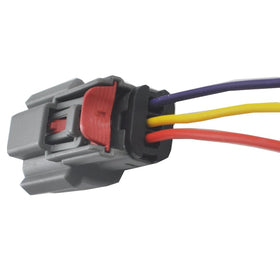 Autowxjq harness held in hand for scale demonstrating compact size advantage