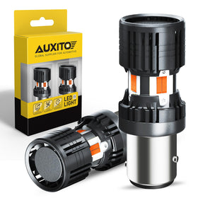 AUXITO 1157 pack front view showing two amber bulbs and plug-and-play benefit