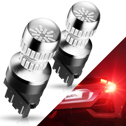AUXITO front view of 3157 red LED bulb showing bright red output and fit