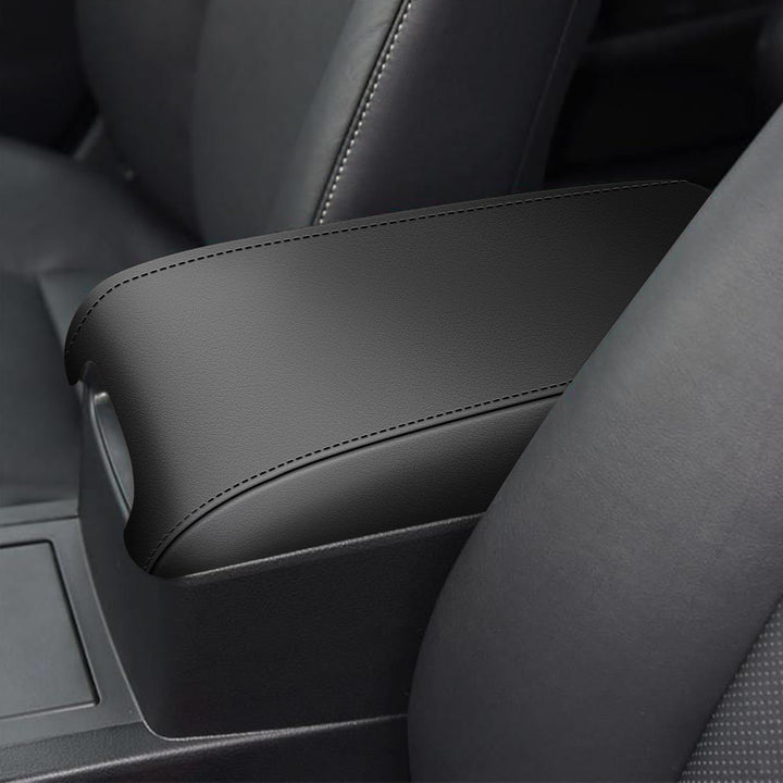 awnexuct front view armrest cover on Camry console showing neat fit and protection