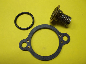 B. toys thermostat close-up showing valve and spring for reliable 160°F operation