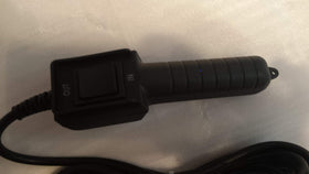 Badlands remote with 12-foot cord laid out to demonstrate reach and safe positioning