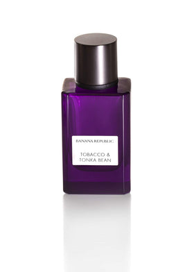 Banana Republic perfume bottle in hand demonstrating compact 2.5 oz travel-friendly size