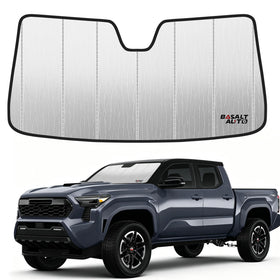 BasaltAuto front view of sun shade fitted to Tacoma showing full windshield coverage and protection