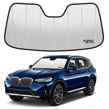 BasaltAuto front view of shade fitted in BMW X3 windshield showing full coverage and protection