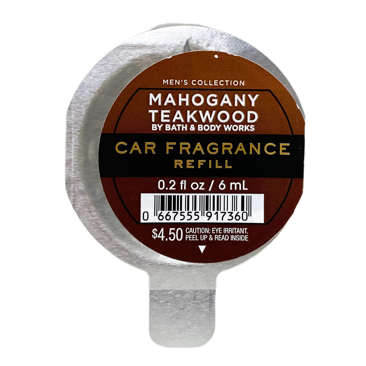 Bath & Body Works Mahogany Teakwood refill installed in car vent, delivering steady woodsy scent for cabin