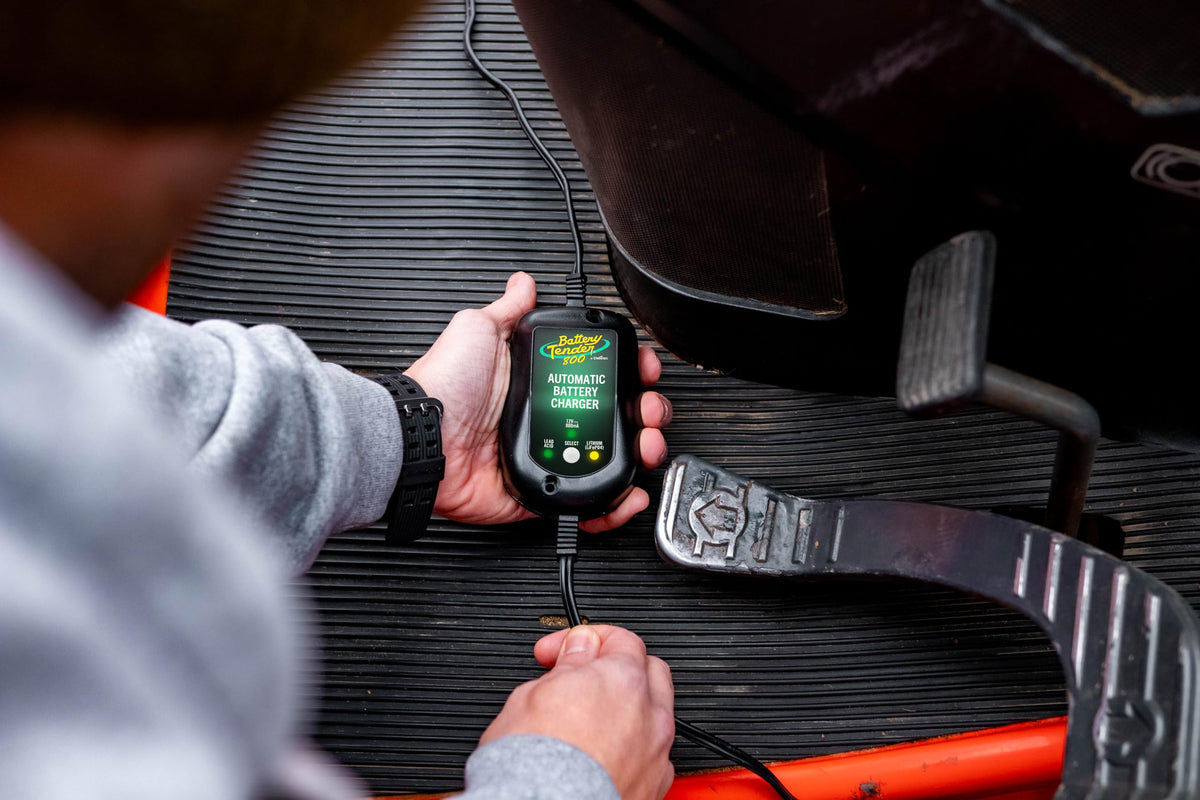 Battery Tender partially submerged demonstrating waterproof durability benefit