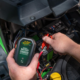 Battery Tender Junior 8V garage mounted lifestyle shot showing tidy storage and convenient access