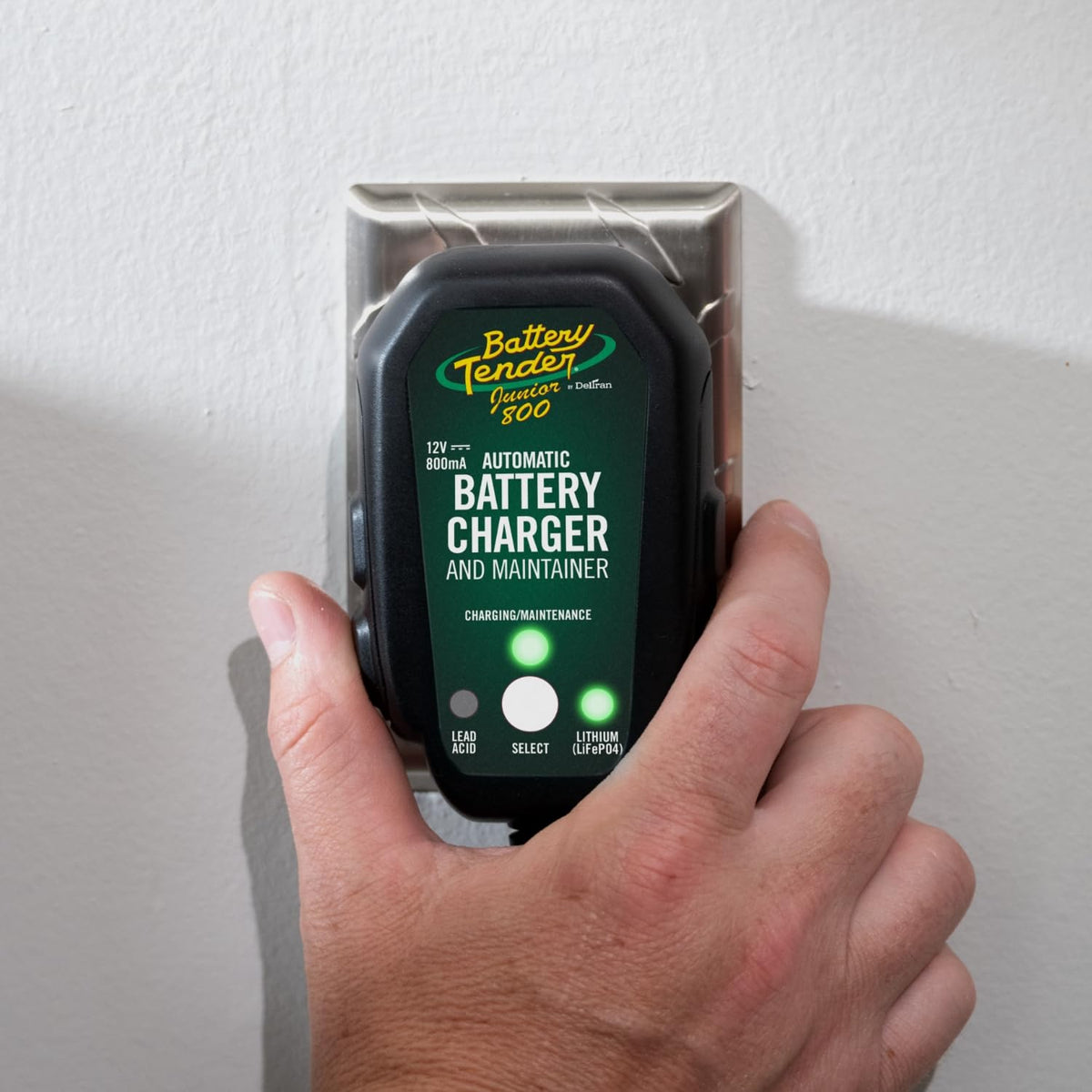 Battery Tender Junior 8V LED indicator closeup showing two-color light for clear charge status