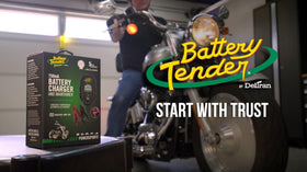 Battery Tender Junior on a garage workbench showing everyday lifestyle use