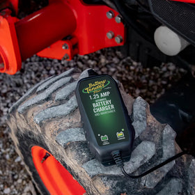 Battery Tender LED indicator lit showing charge status and clear user feedback