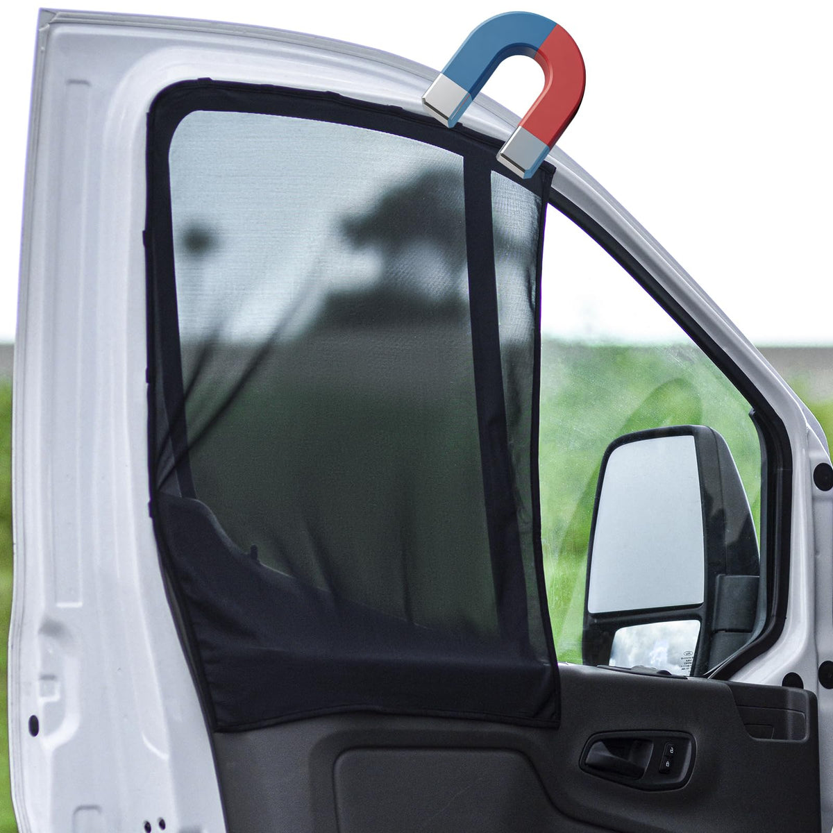 Bayan sunshade front view installed on Sprinter window showing glare reduction