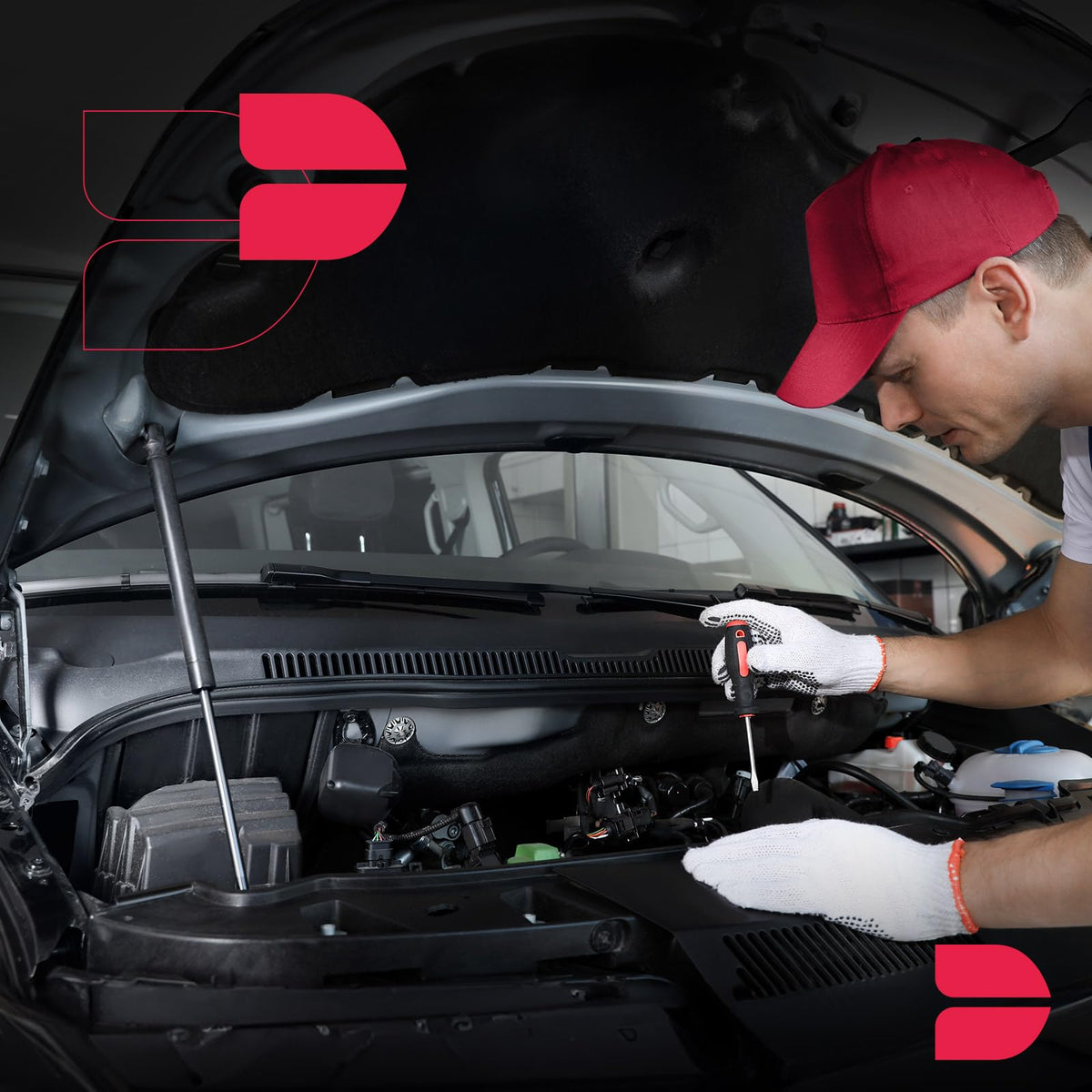 BDFHYK mechanic installing strut in garage showing DIY-friendly replacement