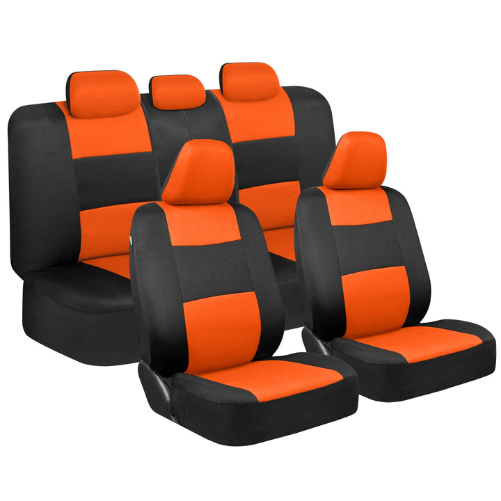 BDK front seat covers orange on black showing snug fit and style benefit