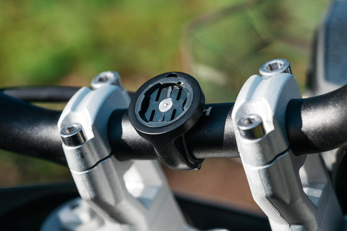Beeline clamp on motorcycle in ride setting showing clear device view