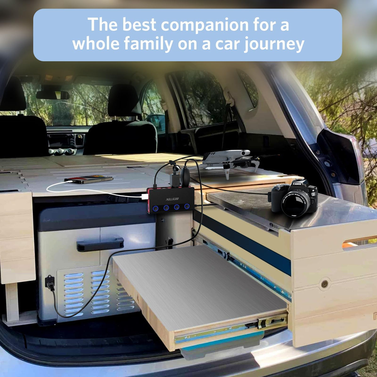 BESTEK held in hand for size comparison showing compact portable design