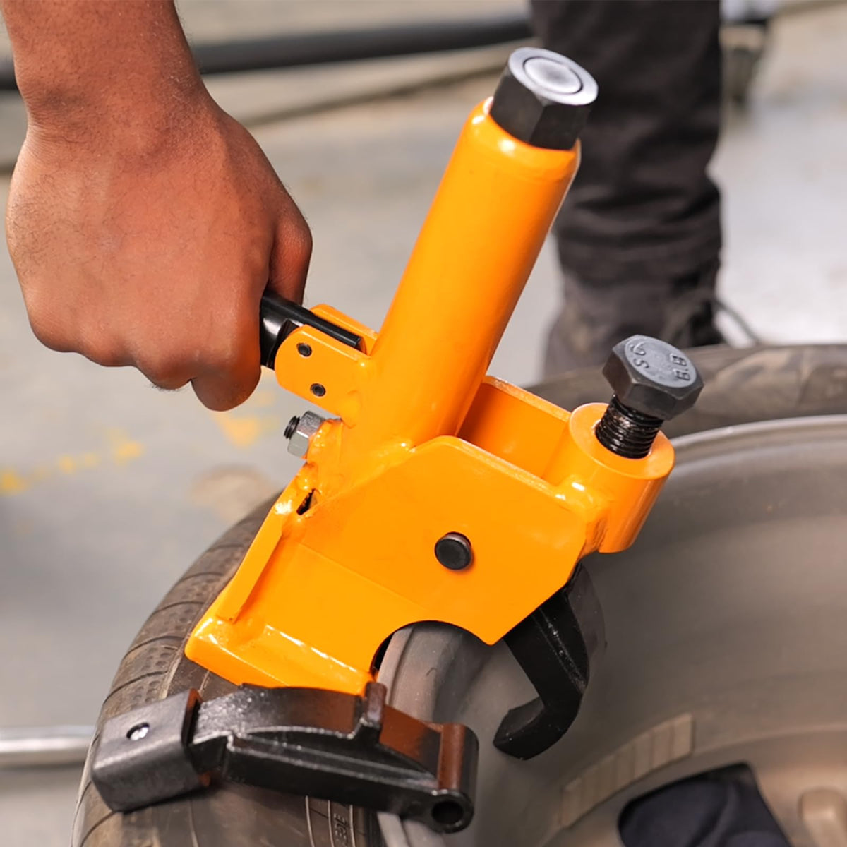 BESTOOL bead breaker in use on an ATV tire enabling bead separation without wheel removal