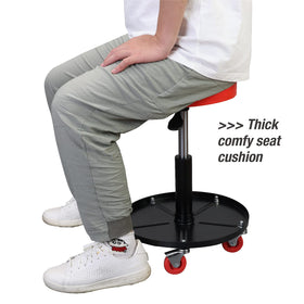 BIG RED next to a car tire to show size and scale for garage storage convenience