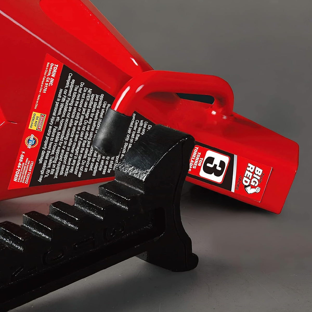 BIG RED product packaging and warranty label showing included one-year coverage