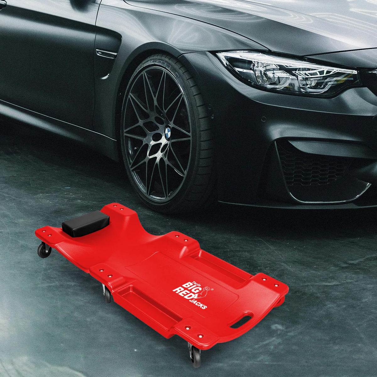 BIG RED mechanic using creeper in garage for faster, more comfortable repairs